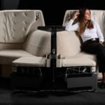 Passenger seated in the SoFab Business Class seat by Optimares
