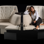 Passenger relaxing in the SoFab Business Class seating solution by Optimares